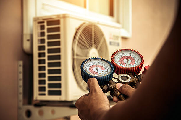 Professional Hvac technician working in Starkville, MS